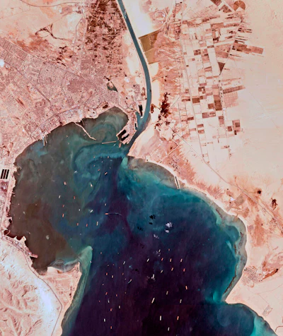 This satellite photo from Planet Labs Inc. shows the Ever Given cargo ship stuck in Egypt's Suez Canal as a mass of ships wait in the Red Sea to pass through the waterway on Monday, March 29.