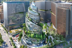 This artist rendering provided by Amazon shows the next phase of the company's headquarters redevelopment to be built in Arlington, Va. The plans released Tuesday, Feb. 2, 2021, features a 350-foot helix-shaped office tower that can be climbed from the outside like a mountain hike. Amazon is making its first foray into providing health care services, announcing Wednesday, March 17, 2021, that it will be offering its Amazon Care telemedicine program to employers nationwide.