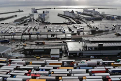 In this file photo, lorries queue at Check-in at the port in Dover, Britain, before entering the EU.