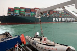 This photo released by the Suez Canal Authority shows the Ever Given, a Panama-flagged cargo ship, after it become wedged across the Suez Canal and blocking traffic.