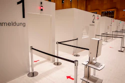 In this file photo dated Monday, Dec. 7, 2020, cabins of a vaccine center that was introduced to the media are seen in Wiesbaden, Germany. With accusations of being slow off the blocks in the race to immunize its citizens against COVID-19, Germany faces the problem of having a glut of vaccines and not enough arms to inject. With its national vaccine campaign lagging far behind that of Israel, Britain and the United States, there are growing calls in this country of 83 million to ditch or rewrite the rulebook.
