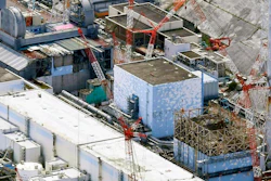 This Sept. 4, 2017, aerial file photo shows Fukushima Dai-ichi nuclear power plant reactors, from bottom at right, Unit 1, Unit 2 and Unit 3, in Okuma town, Fukushima prefecture, northeastern Japan. The head of the wrecked Fukushima nuclear plant said Tuesday, March 2, 2021 there's no need to extend the current target to finish its decommissioning in 30-40 years despite uncertainties about melted fuel inside the plant's three reactors.
