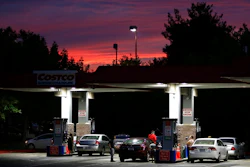 In this Wednesday, Sept. 30, 2015, photo, motorists get gas at a station in Sacramento, Calif. A Northern California city has become what's believed to be the first in the country to ban all new gas stations in an effort to curb emissions. The San Francisco Chronicle reports that the Petaluma City Council voted unanimously Monday, March 1, 2021, to prohibit the creation, expansion, reconstruction and relocation of gas stations.