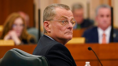 Bill Magness, President and CEO of the Electric Reliability Council of Texas (ERCOT), testifies as the Committees on State Affairs and Energy Resources hold a joint public hearing to consider the factors that led to statewide electrical blackouts, Thursday, Feb. 25, 2021, in Austin, Texas. The hearings were the first in Texas since a blackout that was one of the worst in U.S. history, leaving more than 4 million customers without power and heat in subfreezing temperatures.