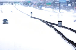 In this Feb. 15, 2021, file photo, traffic is sparse on the snow-covered Interstate 45 near The Woodlands Parkway following an overnight snowfall in The Woodlands, Texas. Temperatures plunged into the teens Monday with light snow and freezing rain.