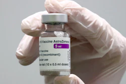 In this file photo, medical staff prepares an AstraZeneca coronavirus vaccine.