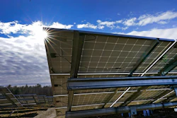 Solar panels face the sun on Burrillville, R.I., at ISM Solar's 10-acre solar farm.
