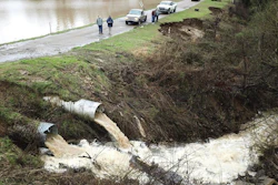 Officials monitor a potential dam/levee failure in the Springridge Place subdivision in Yazoo County, Miss., Feb. 11, 2020.