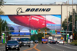 In this Oct. 1, 2020 photo, traffic passes the Boeing airplane production plant, in Everett, Wash.