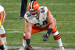Cleveland Browns center JC Tretter snaps the ball during a playoff game against the Pittsburgh Steelers, Pittsburgh, Jan. 10, 2021.