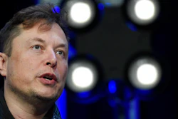 In this March 9, 2020, file photo, Tesla and SpaceX Chief Executive Officer Elon Musk speaks at the SATELLITE Conference and Exhibition in Washington. Musk has tweeted his way into trouble with another federal agency, this time the National Labor Relations Board. The board on Thursday, March 25, 2021 found that a Musk tweet in May of 2018 unlawfully threatened employees with loss of stock options if they decided to be represented by a union. Board members ordered Tesla to make Musk delete the tweet and stop threatening employees with loss of benefits for supporting a labor organization.
