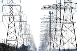This Tuesday, Feb. 16, 2021 file photo shows power lines in Houston. The electric grid manager for most of Texas issued an electricity conservation watch Tuesday, April 13, 2021 appealing to customers to conserve electricity despite weather conditions typical for spring.