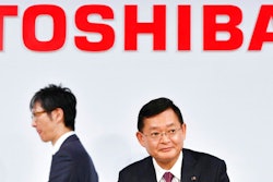 In this November 2018, photo, then Toshiba Corp., Chairman and CEO Nobuaki Kurumatani gets out of a seat after a press conference in Tokyo. Kurumatani stepped down Wednesday, April 14, 2021, a week after the Japanese technology and manufacturing conglomerate said it was studying an acquisition proposal from a global fund where he previously worked. Kurumatani tendered his resignation at a board meeting, and the board accepted, effective Wednesday, Tokyo-based Toshiba said in a statement.