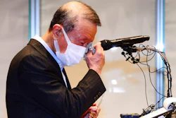 Hong Won-sik, chairman of Namyang Dairy Products, wipes his tears during a press conference at the company's headquarters in Seoul, South Korea on May 4.