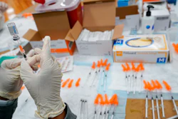 A Northwell Health registered nurses fills a syringe with the Johnson & Johnson COVID-19 vaccine, Albanian Islamic Cultural Center, Staten Island, New York, April 8, 2021.