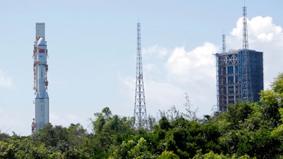 A Long March-7 carrying a Tianzhou-2 cargo spacecraft is moved to the launch area at the Wenchang Spacecraft Launch Site, China, May 16, 2021.