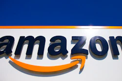 In this April 16, 2020, file photo, the Amazon logo is displayed in Douai, northern France. Amazon said Tuesday, May 18, 2021, that it will continue to ban police use of its face-recognition technology beyond the one-year ban it announced last year.