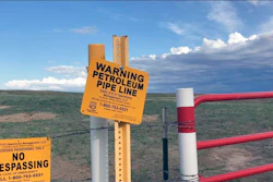 Signs marking the Dakota Access Pipeline are seen north of Cannonball, N.D. and the Standing Rock Reservation on Thursday May 20, 2021.