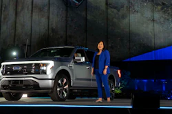 In a photo provided by Ford, Linda Zhang, F-150 Lightning chief engineer, explains details of Ford's first all-electric truck.
