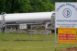 Tanker trucks are parked near the entrance of Colonial Pipeline Company in Charlotte, NC.