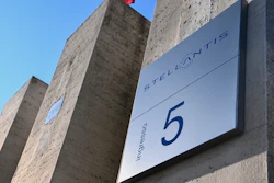 In this file photo, the Stellantis logo is seen on a building of the historic Mirafiori headquarters in Turin, Italy.