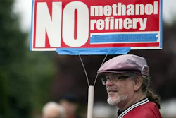 Mark Keely, of Kalama, Wash., stands with other protesters outside the Washington Department of Ecology's Vancouver field office in 2017.
