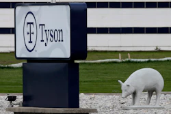 In this May 1, 2020 photo, a sign sits in front of the Tyson Foods plant in Waterloo, IA.