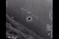 Image from a 2015 video, labelled Gimbal, shows an unexplained object tracked as it soars high along the clouds, traveling against the wind.