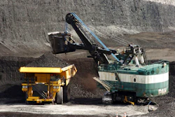 A mechanized shovel loads a haul truck at the Spring Creek coal mine near Decker, Mont., April 4, 2013.