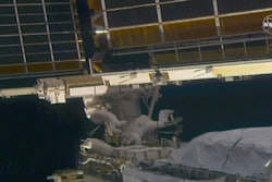 NASA astronaut Shane Kimbrough, left, and French astronaut Thomas Pesquet work on the solar array outside the International Space Station, June 20 2021.