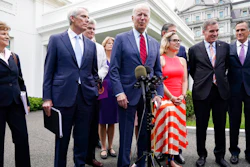 President Joe Biden, with a bipartisan group of senators, speaks Thursday June 24, 2021, outside the White House in Washington. Biden invited members of the group of 21 Republican and Democratic senators to discuss the infrastructure plan. From left are, Sen. Jeanne Shaheen, D-N.H., Sen. Rob Portman, R-Ohio, Sen. Bill Cassidy, R-La., Sen. Lisa Murkowski, R-Alaska, Biden, Sen, Joe Manchin, D-W.Va., rear, Sen. Kyrsten Sinema, D-Ariz, Sen. Mark Warner, D-Va., and Sen. Mitt Romney, R-Utah.