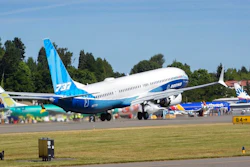 The final version of the 737 MAX, the MAX 10, passes other 737 MAX planes as it takes off from Renton Airport in Renton, Wash., on its first flight Friday, June 18, 2021. The plane will fly over Eastern Washington and then land at Boeing Field.