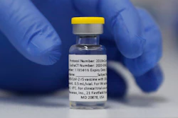 In this Wednesday, Oct. 7, 2020, file photo, a vial of the Phase 3 Novavax coronavirus vaccine is seen ready for use in the trial at St. George's University hospital in London. Novavax says its vaccine appears effective against COVID-19 in a large study, including against variants. Results from the study in the U.S. and Mexico were released on Monday, June 14, 2021.