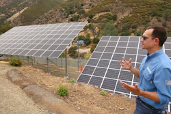 Program lead Bennett Chabot stands by Pacific Gas & Electric's new Remote Grid Initiative site near Yosemite National Park in Briceburg, Calif., June 7, 2021.