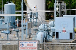 In this May 11, 2021 file photo, a Colonial Pipeline station is seen in Smyrna, Ga., near Atlanta. The Department of Homeland Security has announced new requirements for U.S. pipeline operators to bolster cybersecurity following a May ransomware attack that disrupted gas delivery across the East Coast.