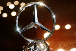 In this Feb. 5, 2015 file photo the logo of a Mercedes car is photographed during an annual press conference of Daimler AG in Stuttgart, Germany.