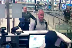 This Dec. 30, 2019 image from security camera video shows Michael L. Taylor, center, and George-Antoine Zayek at passport control at Istanbul Airport in Turkey. The trial in Tokyo of two Americans, Taylor and his son Peter Taylor, charged with helping Nissan’s former chairman, Carlos Ghosn, flee Japan wrapped up Friday, July 2, 2021 with prosecutors seeking prison terms of more than two years for each of them.