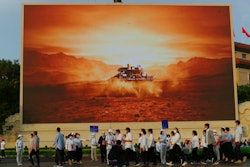 Screen depicting China's Mars spacecraft with its rover landing, Beijing, July 1, 2021.