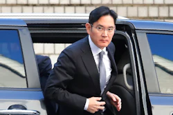 In this Nov. 22, 2019, file photo, Samsung Electronics Vice Chairman Lee Jae-yong gets out of a car at the Seoul High Court in Seoul, South Korea. A day ahead of his release on parole, billionaire Samsung scion Lee Jae-yong appeared in court Thursday, Aug. 12, 2021, for an ongoing trial over charges of financial crimes, a reminder of his looming legal risks even as he leaves prison.