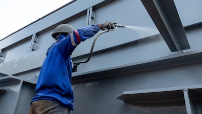 An intumescent paint being applied.