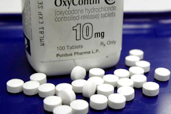 This Feb. 19, 2013, file photo shows OxyContin pills arranged for a photo at a pharmacy in Montpelier, Vt. A federal bankruptcy judge is expected to rule Wednesday, Sept. 1, 2021, on whether to accept a settlement between OxyContin maker Purdue Pharma, the states and thousands of local governments over an opioid crisis that has killed a half-million Americans over the last two decades.