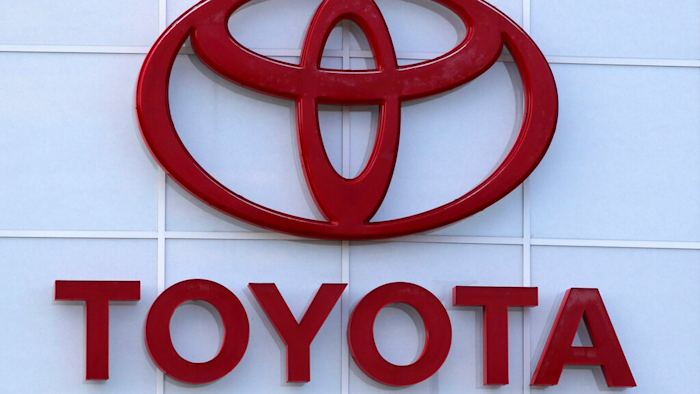 The Toyota logo is shown on a dealership in Manchester, N.H., in this Thursday, Aug. 15, 2019, file photo. Toyota plans to build a new $1.29 billion factory in the U.S. to manufacture batteries for gas-electric hybrid and fully electric vehicles. The plant location wasn't announced, but the company said it eventually will employ 1,750 people and start making batteries in 2025, gradually expanding through 2031.