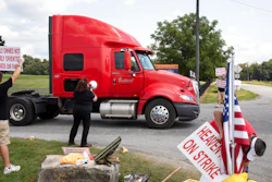 Bettye Jo Boone, a 30 year employee of Heaven Hill, pickets in front of Heaven Hill Distillery in Bardstown, KY on Sept. 13, 2021.