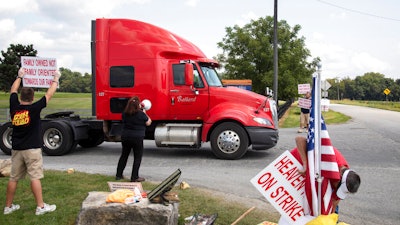 Bettye Jo Boone, a 30 year employee of Heaven Hill, pickets in front of Heaven Hill Distillery in Bardstown, KY on Sept. 13, 2021.