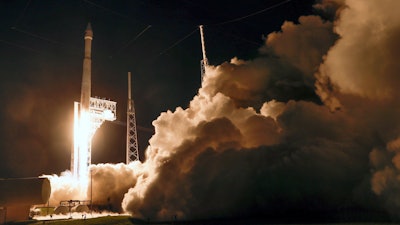 A United Launch Alliance Atlas V rocket carrying the LUCY spacecraft lifts off from Launch Complex 41 at the Cape Canaveral Space Force Station, Saturday, Oct. 16, 2021, in Cape Canaveral, Fla. Lucy, will observe Trojan asteroids, a unique family of asteroids that orbit the sun in front of and behind Jupiter.