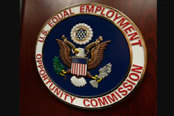 The emblem of the U.S. Equal Employment Opportunity Commission is shown on a podium, Vail, Colo., Feb. 16, 2016.