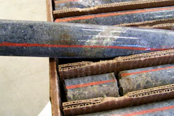 In this Oct. 4, 2011, file photo, a core sample drilled from underground rock near Ely, Minn., shows a band of shiny minerals containing copper, nickel and precious metals, center, that Twin Metals Minnesota LLC, hopes to mine near the Boundary Waters Canoe Area Wilderness in northeastern Minnesota. The Biden administration ordered a study Wednesday, Oct. 20,2021, that could lead to a 20-year ban on mining upstream from the wilderness.