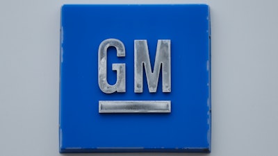 A GM logo is shown at the General Motors Detroit-Hamtramck Assembly plant in Hamtramck, Mich., Jan. 27, 2020. General Motors is testing the water in electric boating by buying a 25% stake in a Seattle company that makes battery-powered outboard motors. The Detroit automaker said Monday, Nov. 22, 2021 that it bought the stake in Pure Watercraft for a venture that it says will develop and commercialize battery electric watercraft.