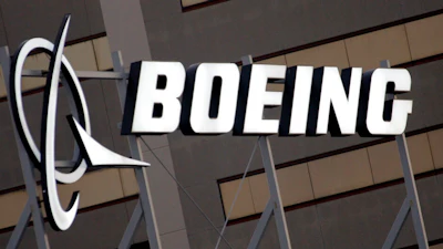 The Boeing Company logo is seen on the property in El Segundo, Calif., Tuesday, Jan. 25, 2011. Insurers for several current and former Boeing board members will pay more than $230 million to settle a lawsuit that accused the directors of failing to address safety warning signs before two of the company’s Max jetliners crashed.