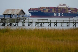 The MSC Naomi container ship sails out from from the port of Charleston, S.C.,Thursday, Oct. 28, 2021. Hampered by rising COVID-19 cases and persistent supply shortages, the U.S. economy slowed sharply to a 2% annual growth rate in the July-September period, the weakest quarterly expansion since the recovery from the pandemic recession began last year.
